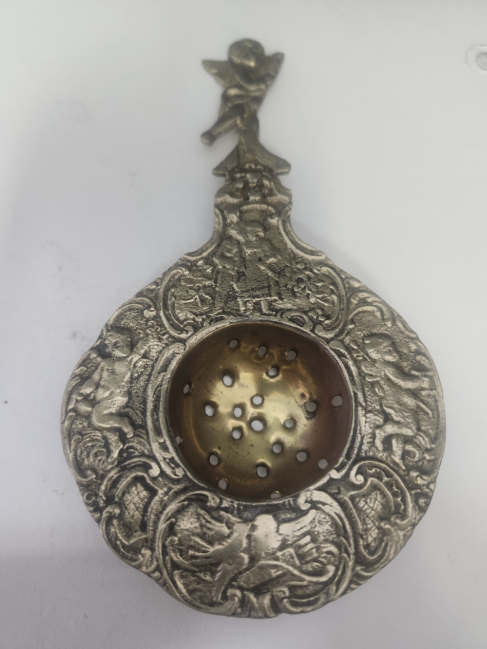 Ornate Metal Tea Strainer in Antique Silver and Brass Finish
